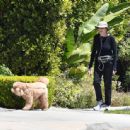 Marcia Cross – walking her dog in Los Angeles - 454 x 445