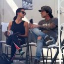 Rocker Tommy Lee and his fiance Sofia Toufa stop by a car wash in Calabasas, California on May 12, 2016. Tommy sat by himself and sent some text messages before returning to Sofia's side - 454 x 525