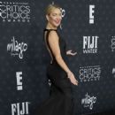 Kate Hudson in a black, silk shoulder-less dress at 30th Annual Critics Choice Awards in Santa Monica