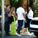 Nina Dobrev – Wearing yellow dress at Ben Bruno’s rehearsal dinner in West Hollywood