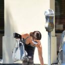 Roselyn Sanchez drops her card at the Meter in LA - 454 x 681