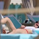 Michelle Hunziker – Seen in Red Bikini at Alpemare Beach in Forte Dei Marmi, Italy - 454 x 303