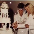Nicko McBrain and Rebecca - 454 x 454