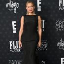 Kate Hudson in a black, silk shoulder-less dress at 30th Annual Critics Choice Awards in Santa Monica