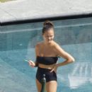 Chrissy Teigen – Seen by a swimming pool in Lake Como - 454 x 681