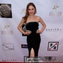 Beverly Hills, CA (March 2 2025) – Charis Michelsen attended The Charmaine Blake Star-Studded Red-Carpet Oscar Viewing Gala honoring Mario Van Peebles, Vanessa Williams, and others