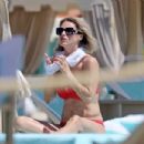 Michelle Hunziker – Seen in Red Bikini at Alpemare Beach in Forte Dei Marmi, Italy - 454 x 303