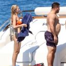 Shirtless Ronaldo Nazário, 45, packs on the PDA with his bikini-clad girlfriend Celina Locks, 32, aboard lavish yacht during romantic Formentera getaway - 454 x 502