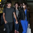 Liam Payne and his girlfriend, Danielle Peazer, were seen exiting Heathrow Airport in London this afternoon, July 16. The young couple spent the weekend in Venice