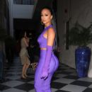 Draya Michele &#8211; In a purple ensemble arrives to the Herve Leger x Law Roach Collection Launch Party