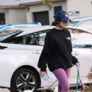 Lucy Hale – Walks her two white dogs in Studio City