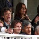 Mick Jagger and L'Wren Scott watches the cricket during the 2nd NatWest One Day International between England and Australia at Lord's on September 6, 2009 in London, England - 454 x 303