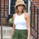 Cara Delevingne – All smiles with her fluffy bucket hat in Manhattan’s Meatpacking District