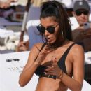 Metisha Schaefer in Black Bikini at the beach in Miami - 454 x 809