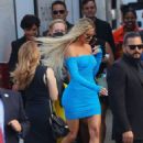 Khloe Kardashian – In a turquoise mini dress attending the Disney Hulu Upfront in NY