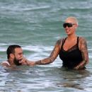 Amber Rose and French Montana on the beach in Miami, Florida - May 14, 2017 - 454 x 326