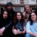 Singles (1992) On Set - Front Row – From left to right, Chris Cornell – Soundgarden, Matt Dillon, Cameron Crowe. Back Row – From left to right, Jeff Ament (Pearl Jam) and Layne Staley (Alice in Chains).