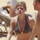 Jennette McCurdy wearing a pretty bikini and board shorts was spotted kayaking with a male friend in Maui