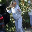 Kate Hudson – Gets playful with her fiance Danny Fujikawa in Los Angeles