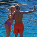 Caroline Stanbury – Seen In a purple bikini with her husband Sergio Carrallo at Mykonos - 454 x 680