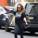 Olivia Wilde – Wearing ‘The Strokes’ band tee at the Tracy Anderson Studio