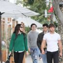 Amelia Hamlin – Wearing a green sweater with boyfriend Eyal Booker at Croft Alley in Beverly Hills - 454 x 681