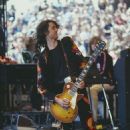 Jimmy Page performing at the Day on the Green at Oakland–Alameda County Coliseum in Oakland on July 23, 1977 - 454 x 695