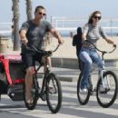 Kathryn Boyd and Josh Brolin – Ride bicycles by the beach in Santa Monica - 454 x 340