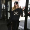 Paris Hilton – Arrives at LAX International Airport in Los Angeles