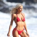 Brennah Black – In red bikini on photoshoot  for 138 Water in Malibu - 454 x 681