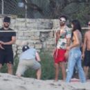 Camila Morrone and Leonardo DiCaprio play volleyball on the beach in Malibu