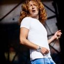 Robert Plant performing during Day on the Green at Oakland Coliseum in Oakland, CA on July 24, 1977 - 454 x 658