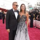 Kevin Costner and Christine Baumgartner - The 94th Annual Academy Awards (2022) - 409 x 612