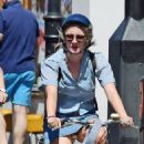 Saoirse Ronan – With Jack Lowden are seen riding bikes in East London - 454 x 598