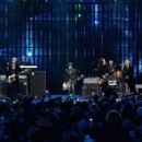 Inductees Joan Jett and The Blackhearts perform on stage with Dave Grohl and Miley Cyrus during the 30th Annual Rock And Roll Hall Of Fame Induction Ceremony at Public Hall on April 18, 2015 in Cleveland, Ohio.