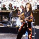Jimmy Page performing at the Day on the Green at Oakland–Alameda County Coliseum in Oakland on July 23, 1977 - 454 x 681