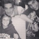 Jeff Soffer with stepsons Cy and Flynn Busson