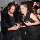 Cougar alert! Sharon Stone leaves Vogue party with Argentinian model Martin Mica in Brazil - 454 x 548