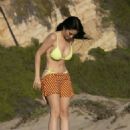Claudia Alende in Yellow Bikini on the beach in Los Angeles