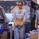 Bella Hadid – Shows off her abs as she steps out in New York