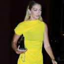 Gigi Hadid – Photographed out in night wearing a yellow dress in New York