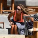Laura Anderson – Seen in a coral swimsuit in Mykonos - 454 x 302