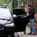 Taylor Swift and Joe Alwyn leaving a restaurant in London