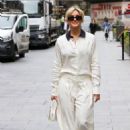 Ashley Roberts – Wearing white trousers and matching top in London - 454 x 661