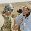 A costumed Robin Lane Fox chats with director Oliver Stone.