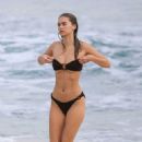 Gabriella Brooks in Black Bikini and Liam Hemsworth on the beach in Byron Bay - 454 x 598