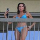 Luciana Gimenez – In a blue bikini on the balcony of her hotel in Rio de Janeiro - 454 x 636