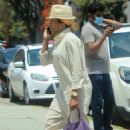 Regina King – Carrying a purple leather Gucci purse in West Hollywood