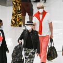 Cyndi Lauper – With husband David Thornton arrive at JFK Airport in New York - 454 x 643