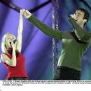 Christina Aguilera and Enrique Iglesias perform during the halftime show at Super Bowl XXXIV (2000) - 454 x 364
